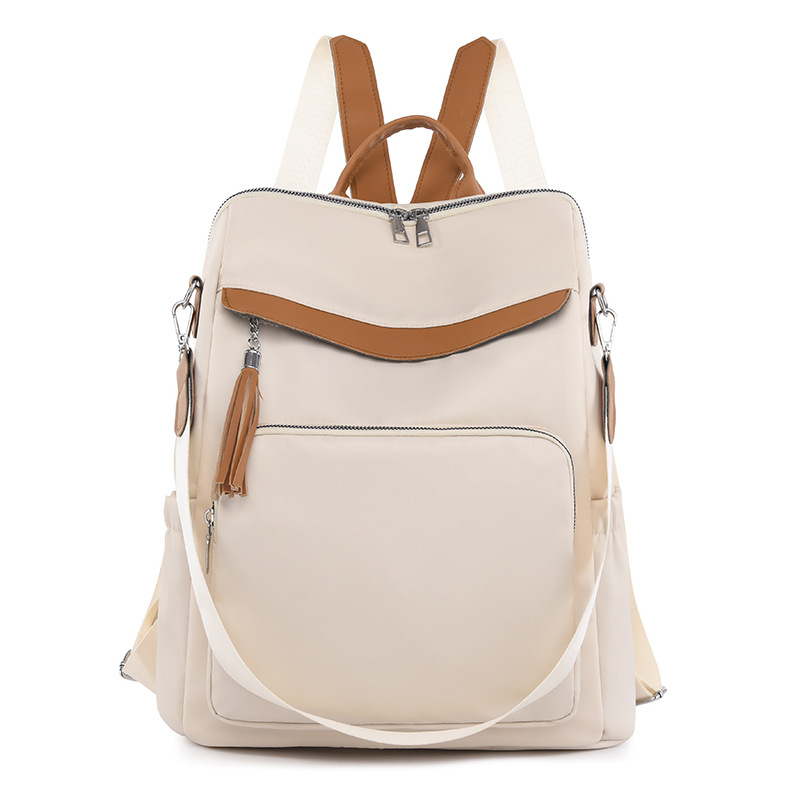 Comercio exterior al por mayor primavera nuevo estilo casual damas Oxford color contraste mochila simple y versátil multifuncional de doble uso