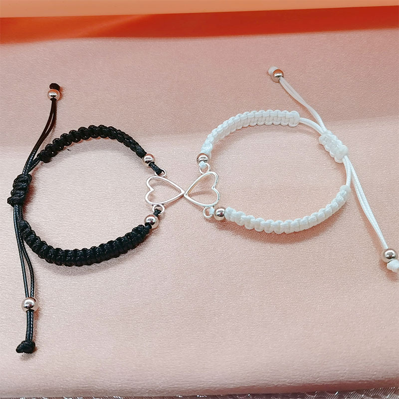 Pulsera pareja corazón hueco trenzada ajustable blanco negro_voghion.com