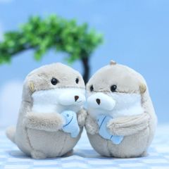 ネットの赤いかわいい小さいアザラシはぬいぐるみの海洋の動物の公の子のカバンを掛けて飾ります人形のキーホルダーの人形を掛けます。