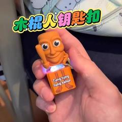 クロスボーダーウッドスティックマンボタンサウンドクリエイティブストレスリリーフおもちゃアメリカの山と海の経典面白いスクールバッグペンダントキーホルダー