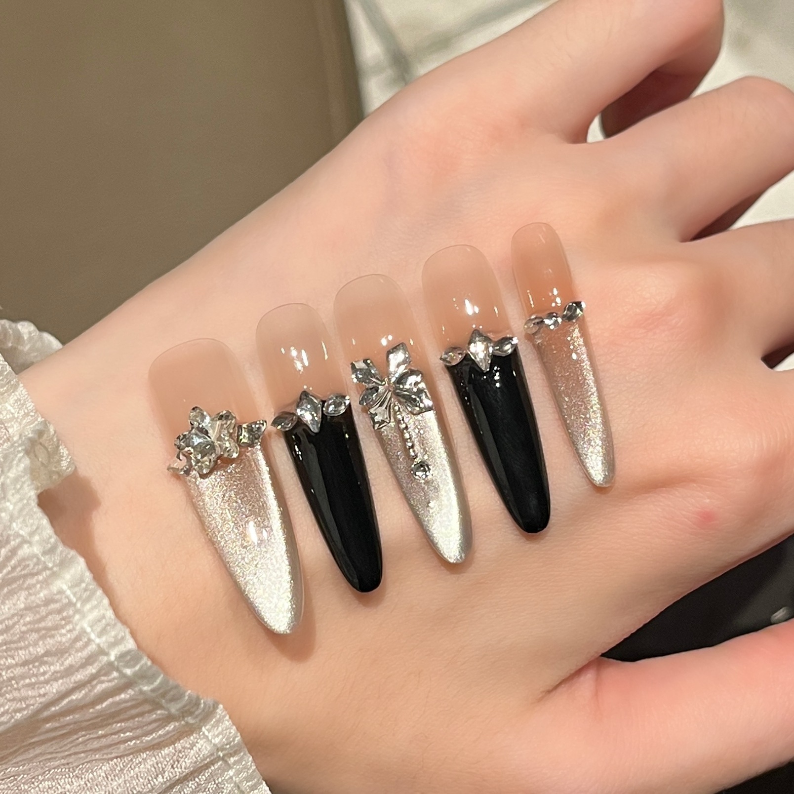 Uñas postizas de ojo de gato transfronterizas, piezas de uñas hechas a mano, uñas postizas, arte de uñas portátil, estilo largo de alta gama.