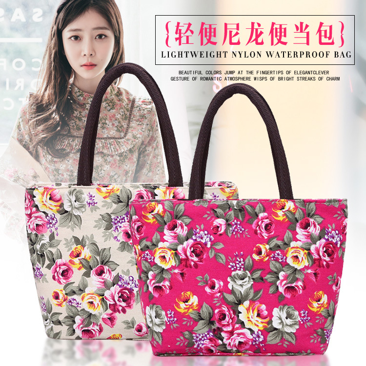 Nueva moda casual mamá monedero portátil bolso de lona con estampado de rosas bolso portátil para viajes de mediana edad y ancianos