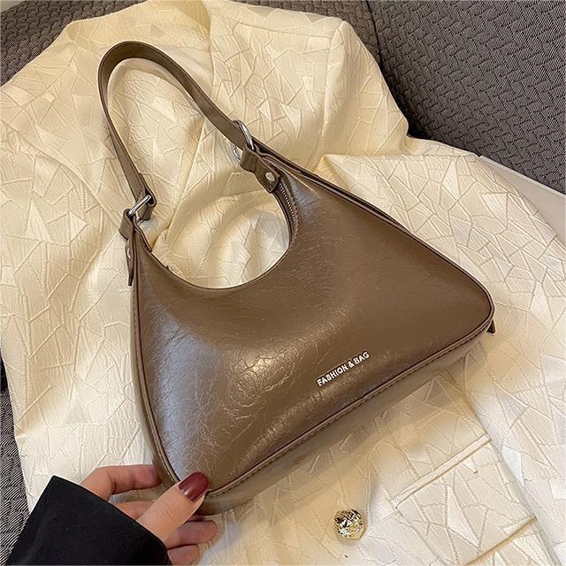 Nicho de alta calidad crack portátil pequeña bolsa para las mujeres 2023 nuevo otoño y el invierno de la moda bolsa de axilas todo-fósforo bolsa de hombro
