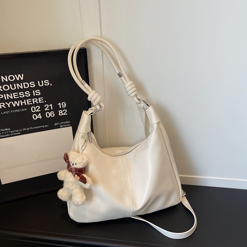 Bolsos de textura para mujeres 2026 nueva moda popular simple sensación cotidiana bolso de hombro de gran capacidad bolsa de viaje