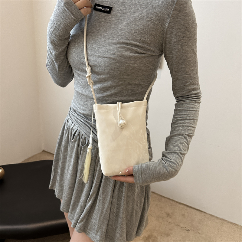 Nueva bolso chino para mujeres 2024 verano nuevo estilo nacional bolso de mano pequeño bolso ligero con cheongsam perla bolso móvil