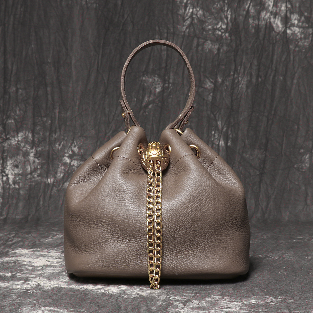 新しい手作りのトップ層牛革化粧バッグファッションカジュアルな真皮バケツバッグ高品質ソフトレザーチェーンバッグ