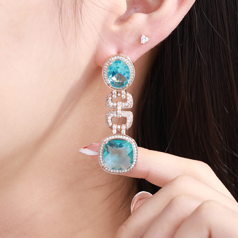 Xuping aleación de cobre color serie de aretes de arco de arco de arco de lujo ligero de estilo largo cuadrado geométrico