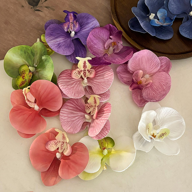 Wearing flower phalaenopsis side clip hairpin in this world, atmosphere feeling, photo, hair clip, seaside holiday hair accessories, headdress_voghion.com