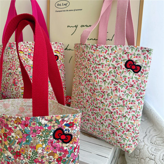 Small floral KT cat cotton shoulder bag small floral element small fresh hand shoulder cloth bag hand bag wholesale
