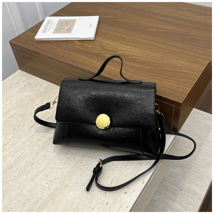 Bolso de mano de alta sensación para mujeres 2026 verano nuevo nicho de lujo ligero bolso cuadrado retrógrado ocio mochila de hombro