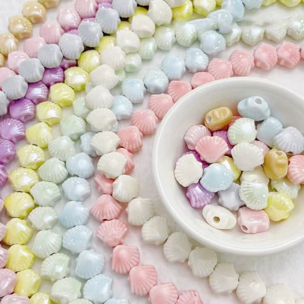 Cuentas de cerámica flor cuadrada estrella de cinco puntas pequeña flor de ciruelo trébol de cuatro hojas pequeño elefante pequeño conejo de jade color mixto cuentas de agujeros rectos cuentas hechas a mano