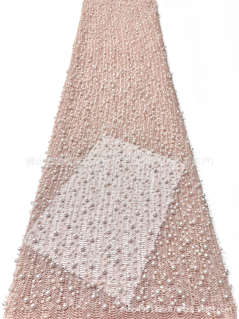 Tejido de malla de perlas hechas a mano de alto grado ondulado vertical tridimensional bordado de perlas vestido de boda tela de diseño