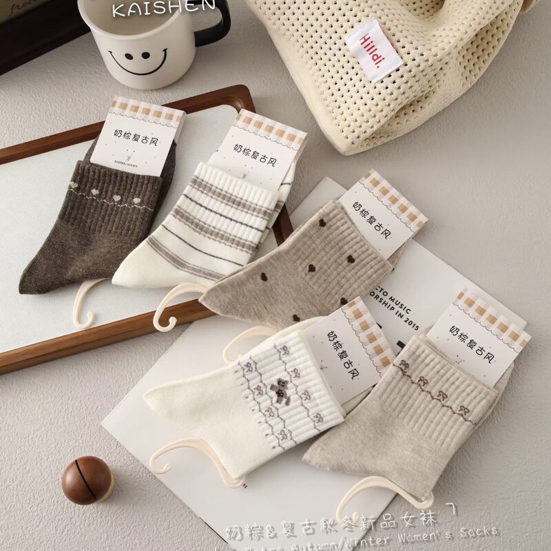 Kaisen autumn and winter collection: brown women's mid-calf socks, featuring cute cartoon designs, a student/college style, sporty look, dark color palette, and versatile oatmeal color