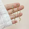 Golden mosquito coil with tassels, ear clips