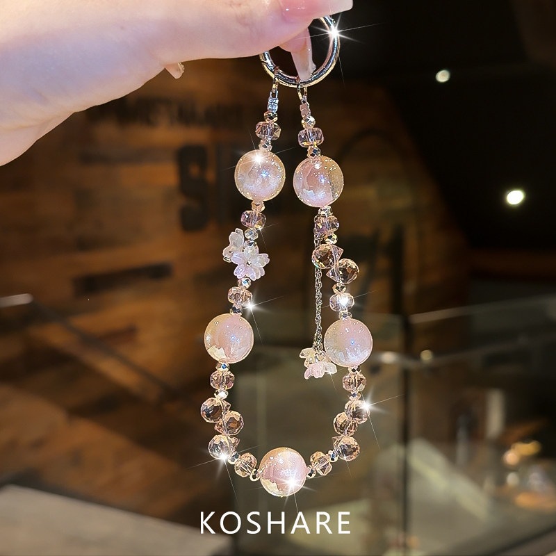 Honey Peach Cat Flash Diamond cadena de teléfonos móviles ligera de lujo nicho de alta calidad bolsos de cristal colgante colgante de mano lindos dibujos animados