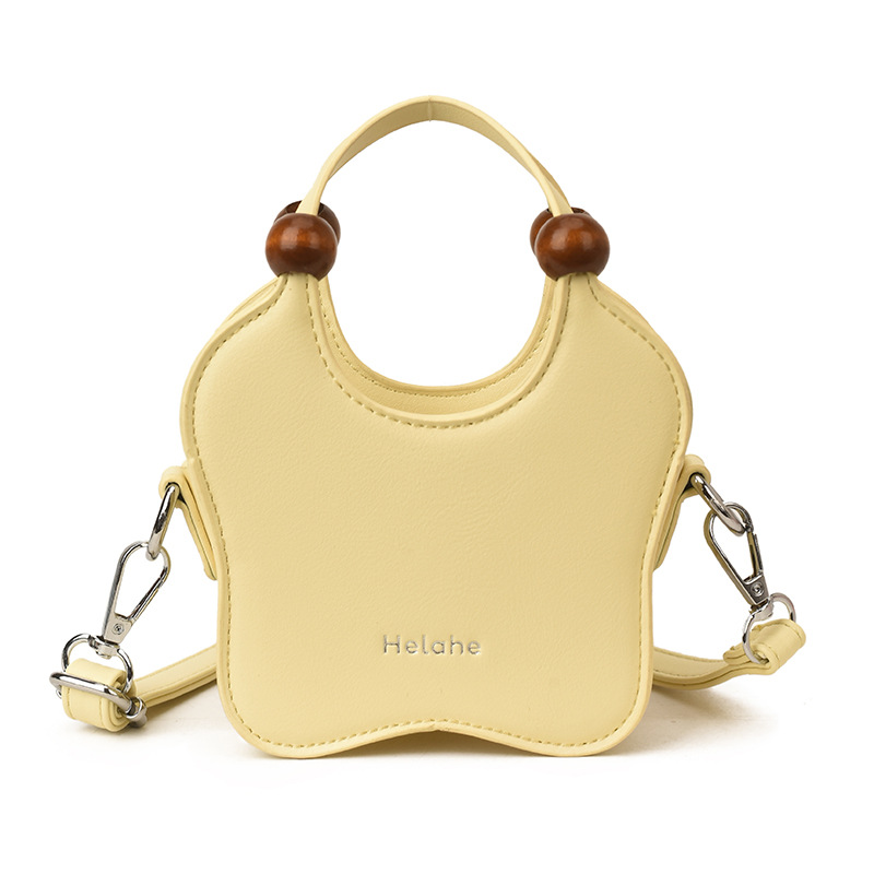 Bonita pequeña estrella en forma de bolso de hombro para niños y niñas, exquisita mini bolso de bebé, bolso para niños de comercio exterior transfronterizo