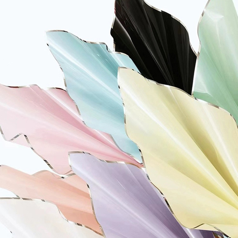 Nuevo papel de embalaje de iones de plata de color sólido película de gelatina de plata papel de borde impermeable papel florista materiales de flor
