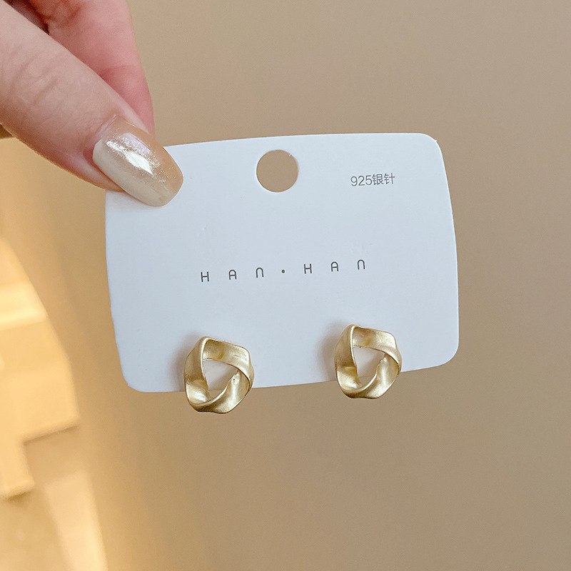 Pendientes al por mayor transfronterizos puestos del mercado nocturno Pendientes de origen empresarial Pendientes de borla de temperamento de todo fósforo público Pendientes coreanos