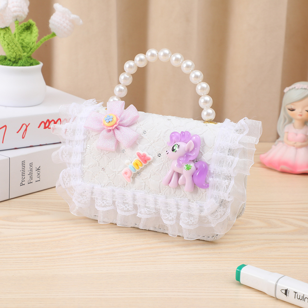 Cute divertido bolso para niños pequeño Xiangfeng perla monedero portátil pequeña princesa bolsa de almacenamiento bandolera estilo ins al por mayor