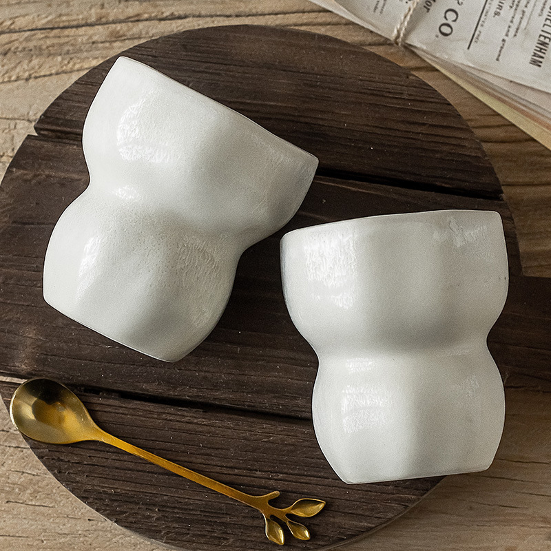 Taza de cerámica de alto valor de apariencia, taza de té doméstica, taza de pinza de mano, taza de agua de estilo japonés sin mango