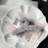 Gray plush grab