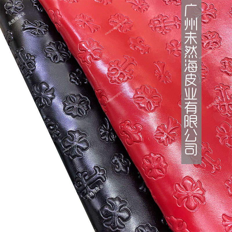 黑红压纹牛皮潮流服装视频用真皮现货