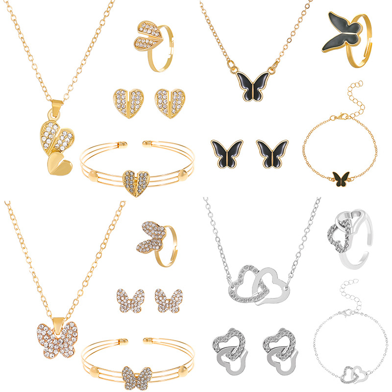 Nuevo diamante transfronterizo mariposa amor joyería traje ins estilo europeo y americano diseño creativo collar en forma de corazón conjunto de cuatro piezas