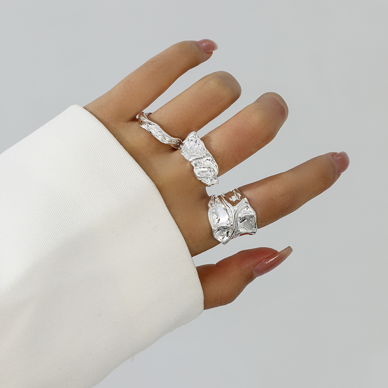 Estilo explosivo transfronterizo europeo y americano, gota de agua brillante, abrazo, anillo abierto, pliegues de metal líquido, anillo cruzado irregular image 14