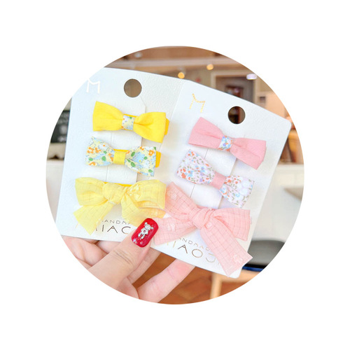 Korean version of three-piece children's hair clip set for little girls fabric floral bow pressure clip baby does not hurt the hair bag cloth clip