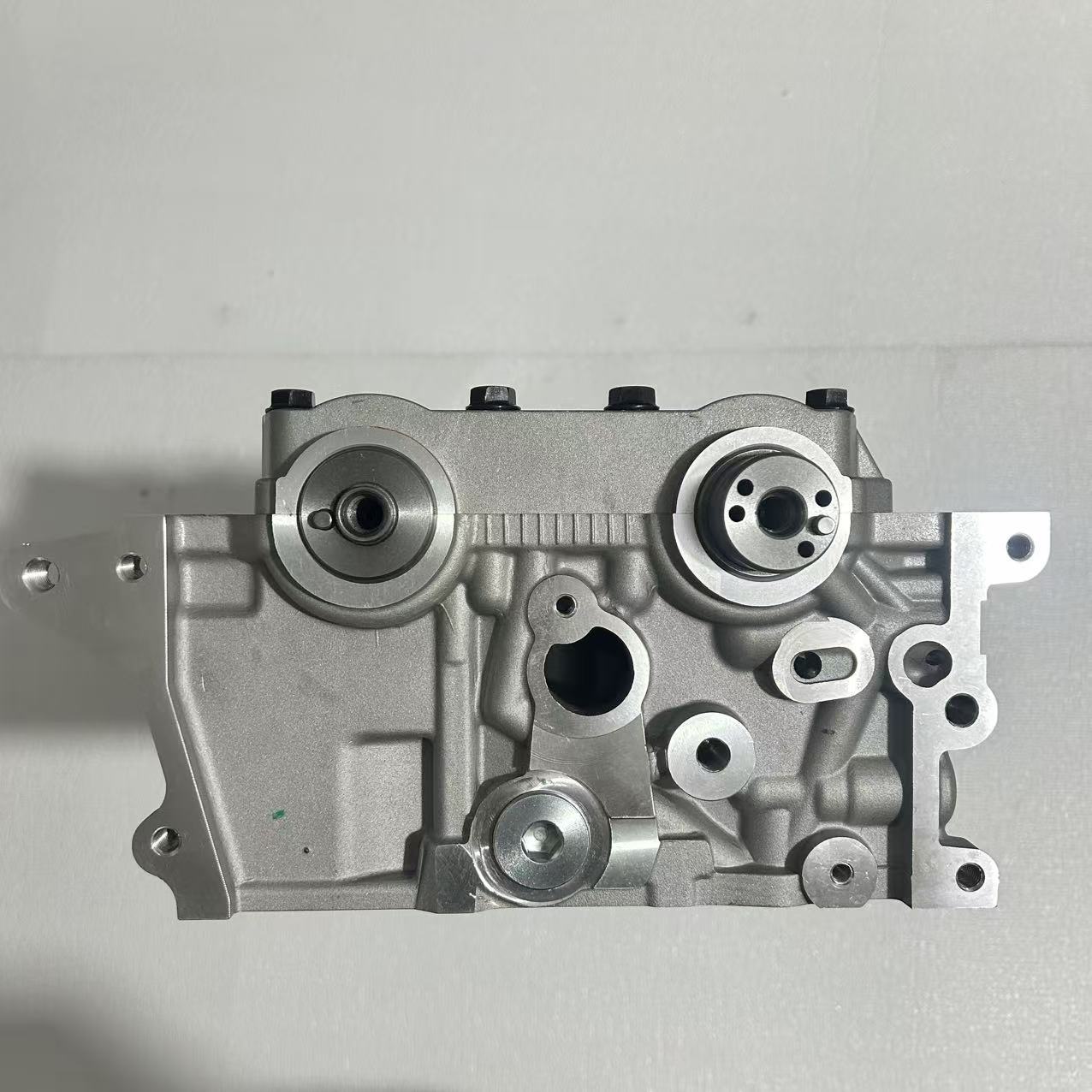 Engine Cylinder Head G4Fg Is Suitable for Cylinder Head Assemblies of Hyundai I20/I30/Ix20/Getz/Kia Rio, Etc