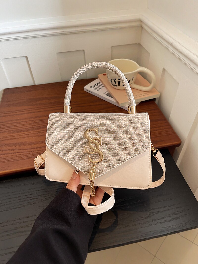 Bolso 2026 nuevo bolso de lujo ligero, letras de moda de mujer, color de mano, bolso de hombro simple y versátil
