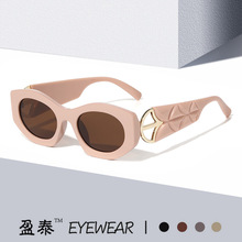 2025跨境新款猫眼时尚太阳镜欧美网红街拍弯弓花纹镜腿大框墨镜女