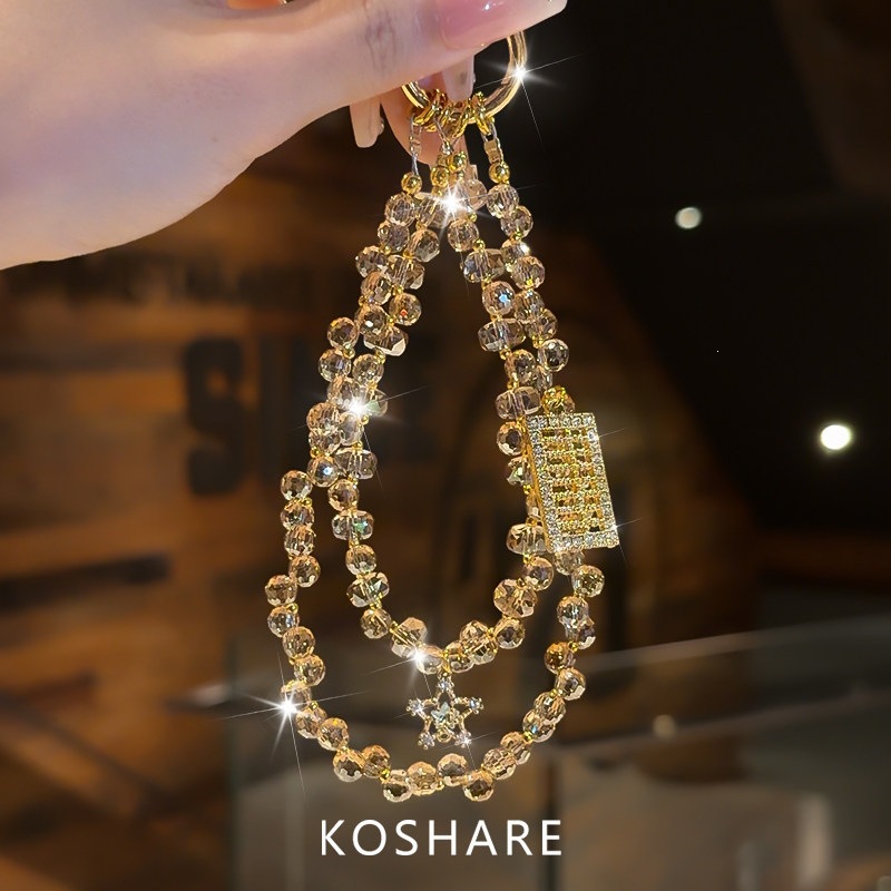 Honey Peach Cat Flash Diamond cadena de teléfonos móviles ligera de lujo nicho de alta calidad bolsos de cristal colgante colgante de mano lindos dibujos animados