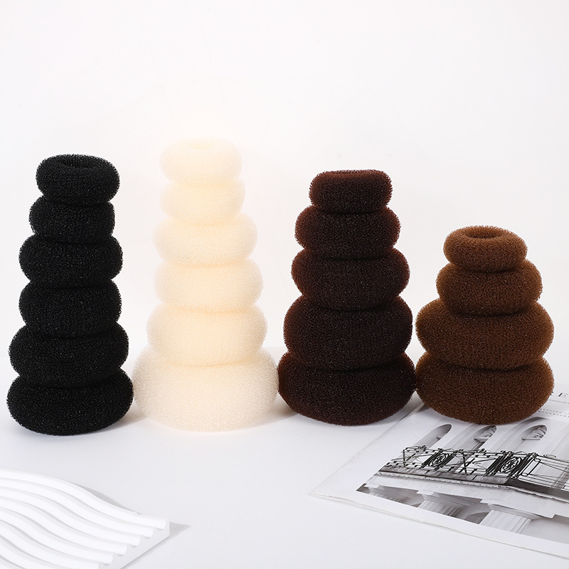 Fabricantes de bolos de cabeza de punto para el cabello atado adornamiento de cabello trenzado artefacto de donut anillo de cabello brote de flores herramientas de cabello