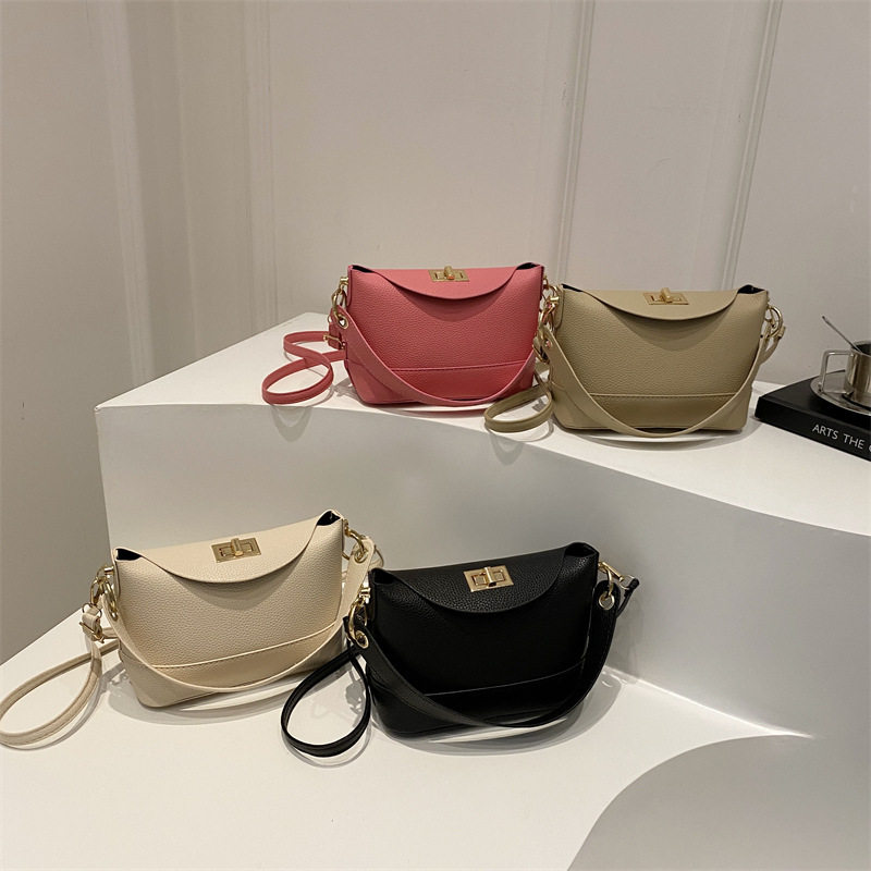 Moda de color sólido litchi 2024, nuevo bloqueo de invierno de estilo exterior de hombro casualidad, bolso de mano pequeño para mujeres