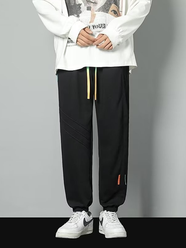 2024 primavera y otoño nuevos pantalones casuales para hombres de moda juvenil marca holgada pantalones deportivos de moda de moda