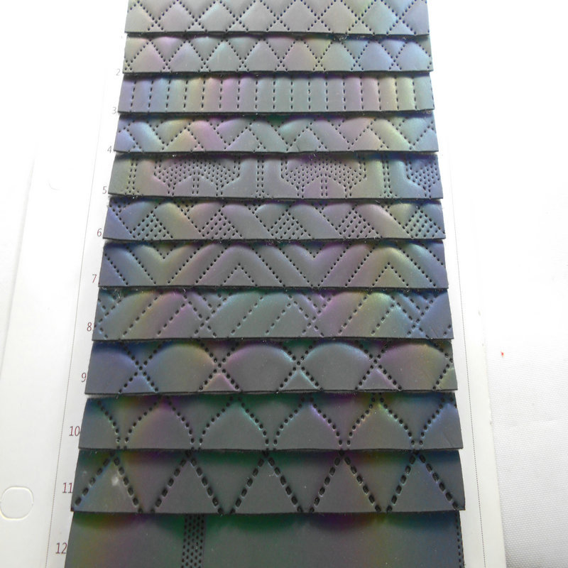 反光镭射间棉皮革绗缝PU间棉绗线布料皮革间棉厂电脑平车开料面料