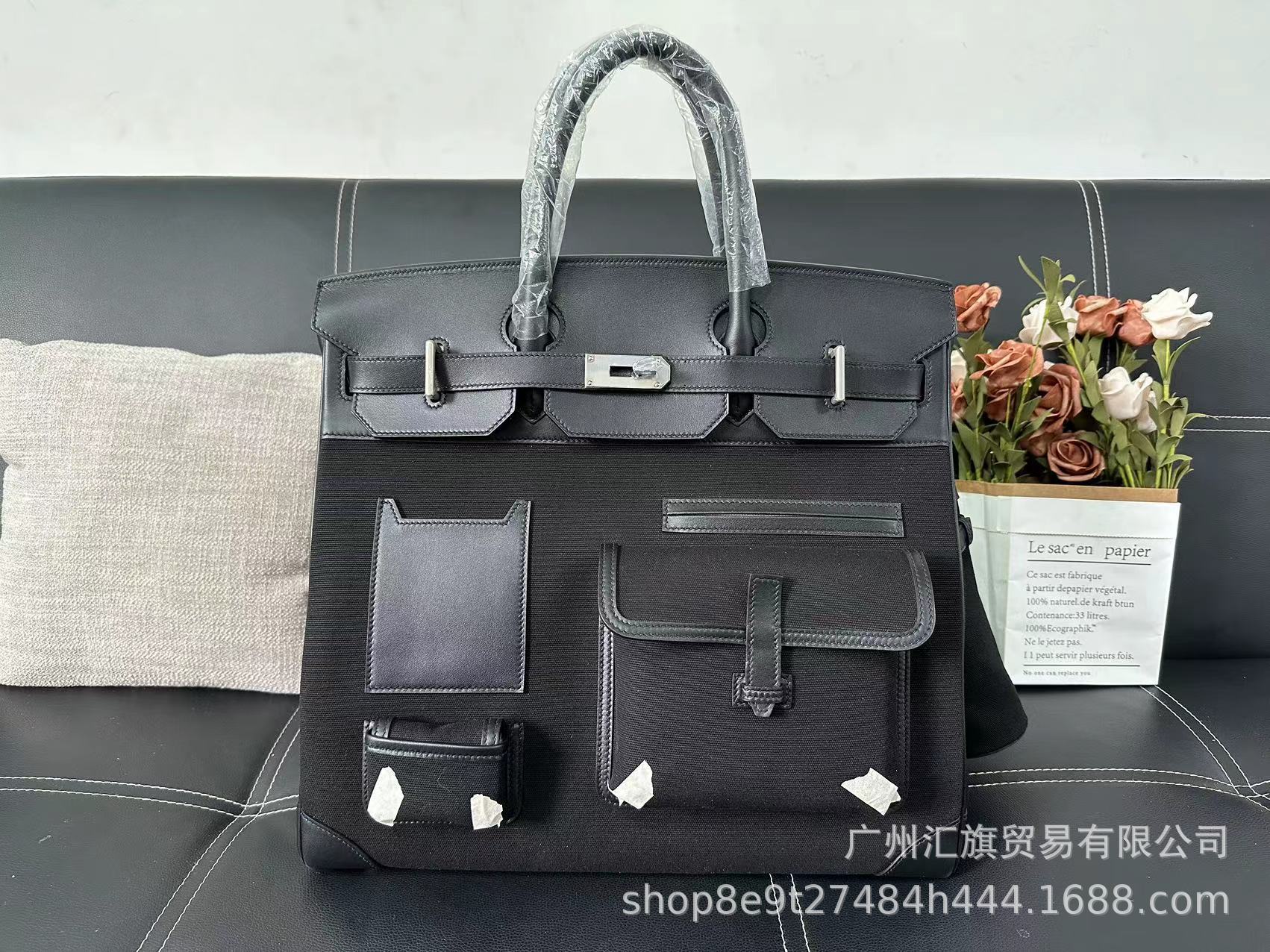 Bolsa de platino directa de fábrica Hac40 bolsas de viaje de color blanco y negro de gran capacidad pulsera de cuero de vaca real de hilo portátil