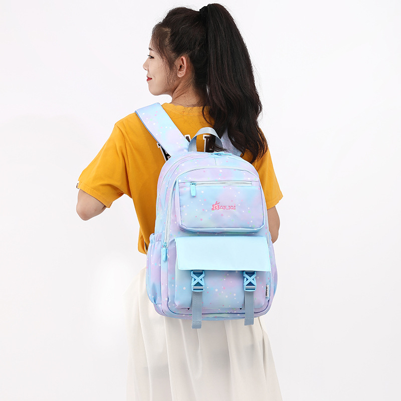 Natural Fish nuevo estudiante de la escuela primaria mochila Niñas Grado 2-5 de gran capacidad de reducción de carga de moda mochila de una sola pieza de entrega