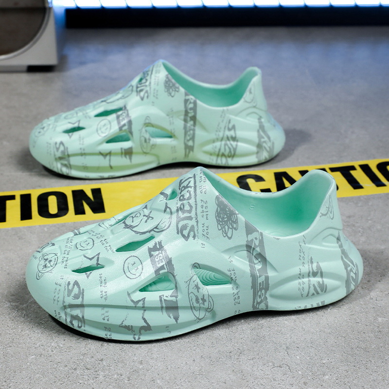 [cross-border] zapatos de cavidad camuflado graffiti de gran tamaño pareja sandalias de cabeza de paquete para hombres zapatos de playa casuales transpirables