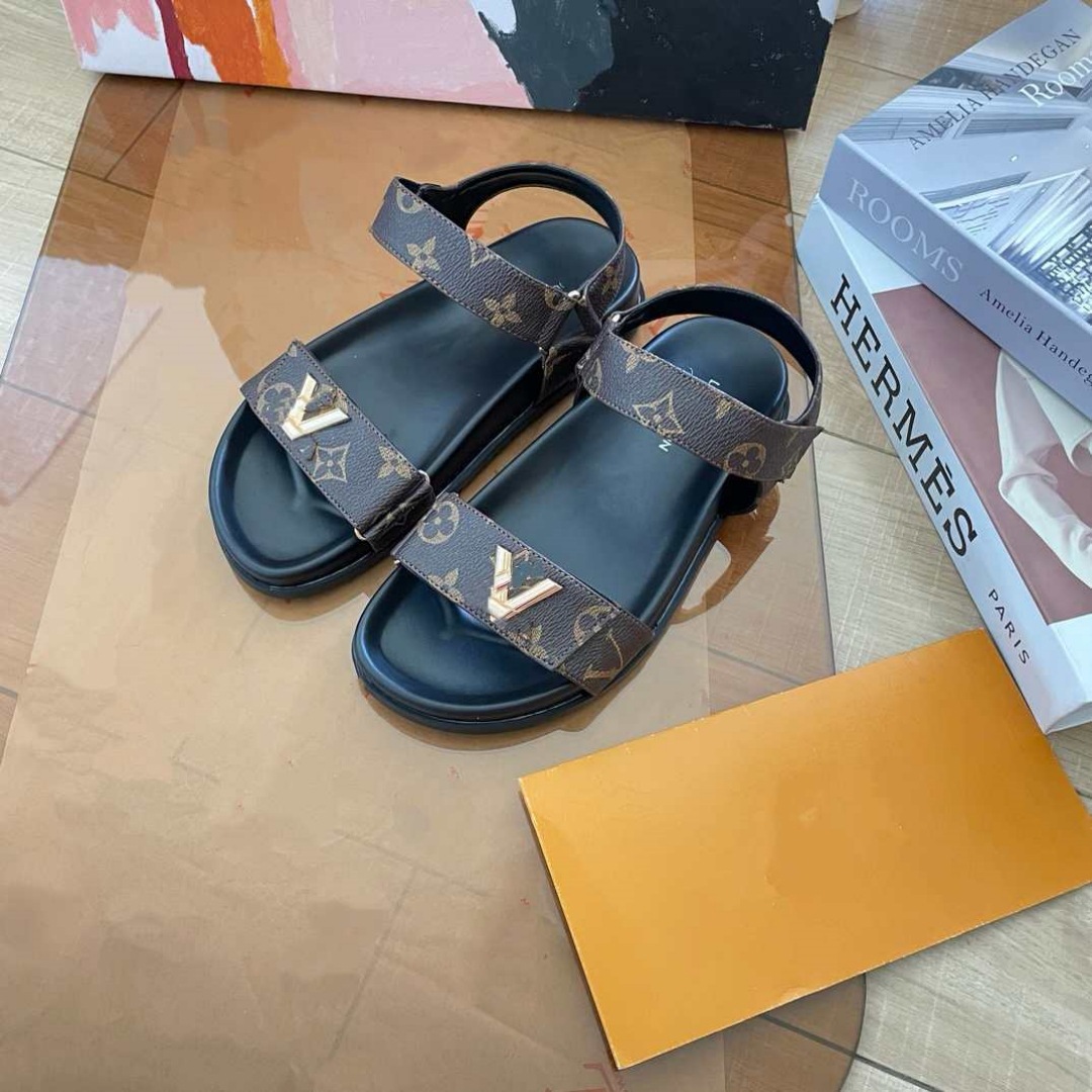 Donkey Home estación europea diseñador de alta versión 2025 nuevas sandalias de playa de cuero zapatillas de hebilla metálica plana