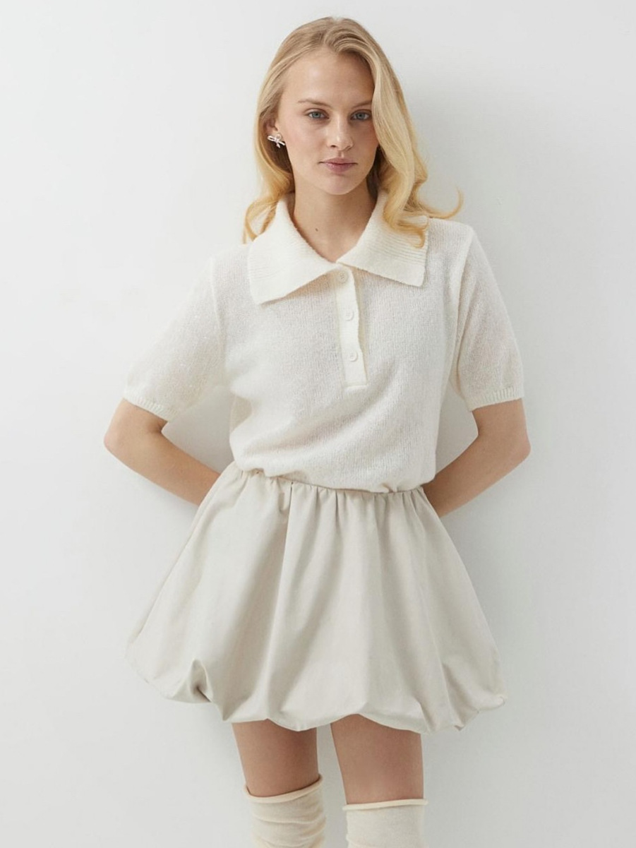 Suéter de manga corta de punto hueco Polo transfronterizo 2025 primavera y verano nueva camiseta de manga abullonada suéter de punto simple mujer