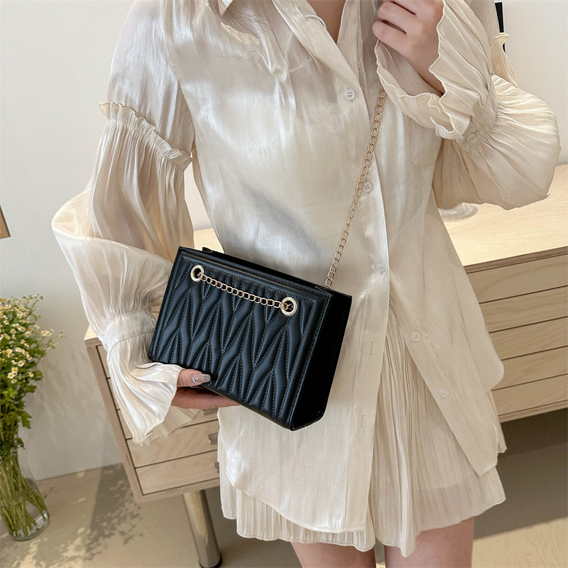 Bolsa de cadena de textura de alta calidad para mujer 2024 nueva moda rombo viajero de un solo hombro mensajero de nicho bolso cuadrado pequeño Tote