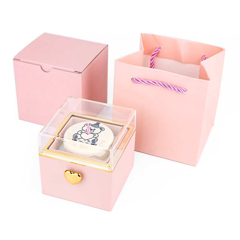 Nueva caja de embalaje de joyería de vela de pastel flip collar de anillo caja de regalo giratoria automática caja de sorpresa creativa