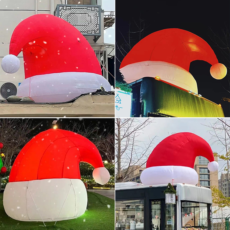空気入れサンタクロースの空気型は壁に登って光るクリスマスツリーを飾って雪だるまの屋外のデパートの漫画の空気型を飾ってカスタマイズします。|undefined