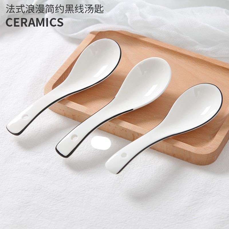Cucharas de cerámica al por mayor, blancas puras con bordes negros, cucharas para sopa, cucharas para arroz, cucharas de mango largo con forma de cisne, vajilla diaria, utensilios de mesa estilo occidental.