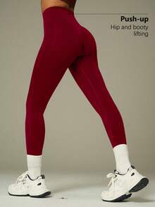 Europa y los Estados Unidos sin costuras cintura alta pantalon de gimnasio de alta cadera para mujeres corriendo al aire libre apertado nueve pantalones de pelusa de miel