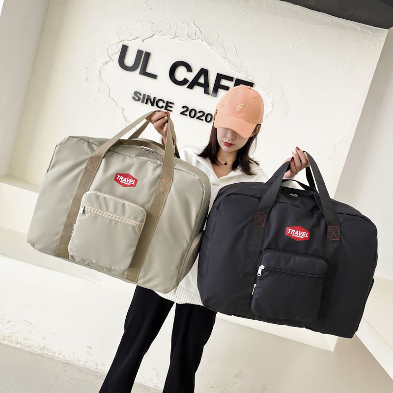 Bolsa de almacenamiento de ropa de mano de tela Oxford Bolsa de almacenamiento de viaje plegable Bolsa impermeable Bolsa de equipaje de corta distancia Bolsa de viaje