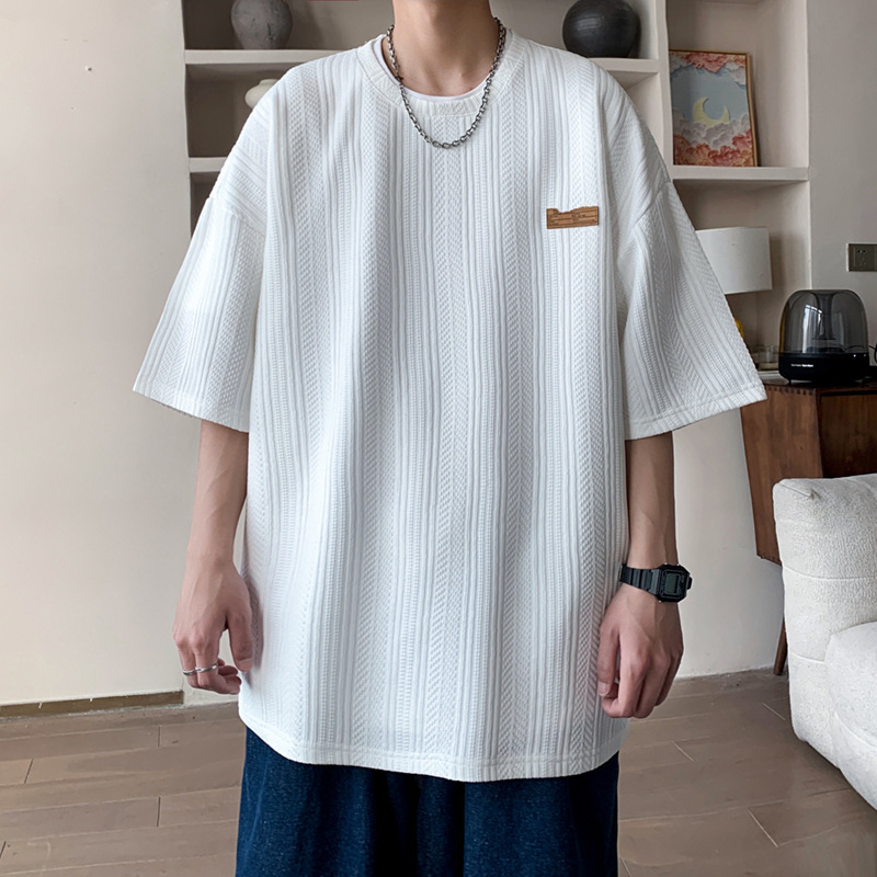 Camiseta de manga corta de verano de Hong Kong Tide para hombres inins coreanos sueltos versátiles Jacquard camiseta de cuello redondo de marca de marea chaqueta transpirable