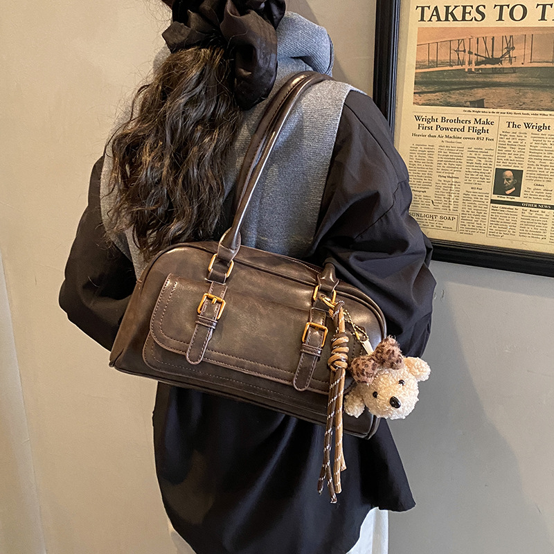 Bolsa de bolos de mano de moda coreana para mujeres 2025 nueva bolsa de almohada casual universal bolsas de hombro para viajar bolsas de brazo